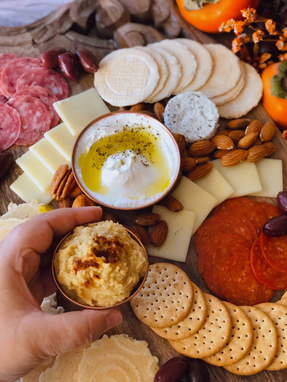 Garlic hummus topped with sumac for a lemony note, perfect for holiday entertainment and your appetizer table