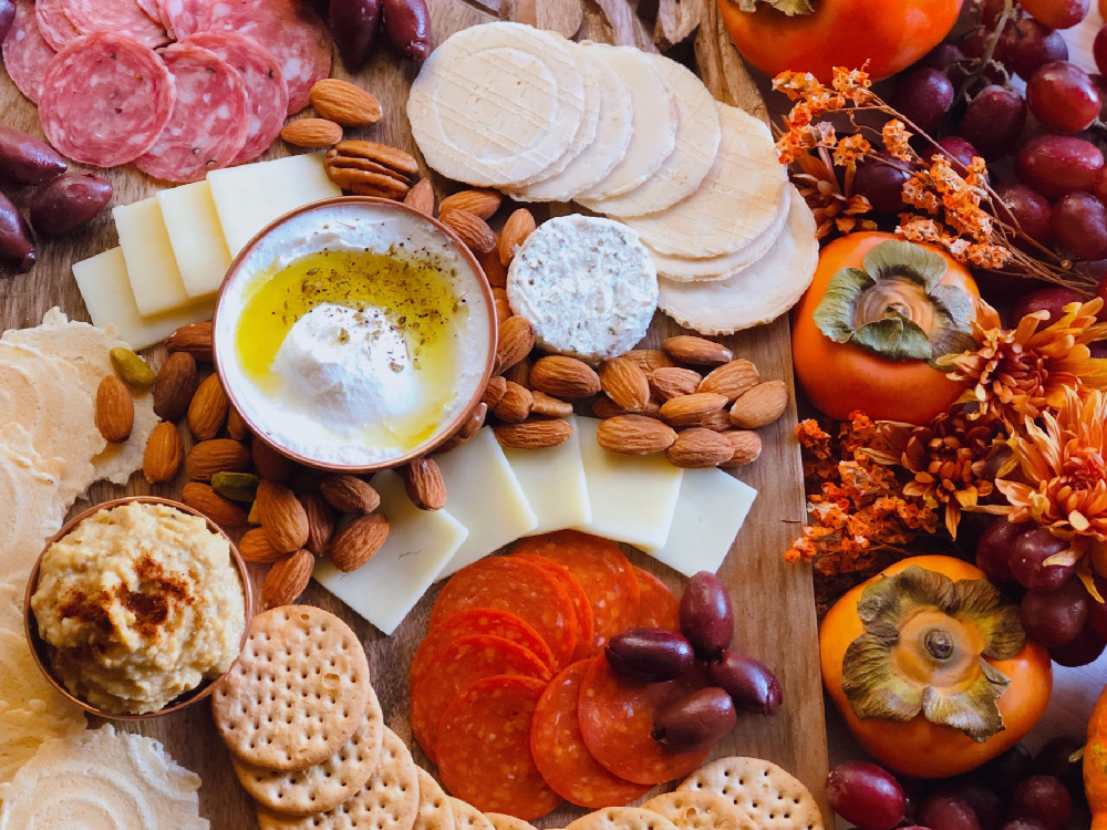 This is the Thanksgiving Charcuterie Board with cold cuts, cheese, nuts and fruits to add to the appetizer table