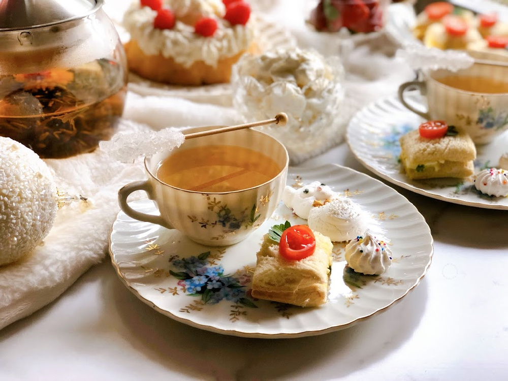 High Tea Party Downton Abbey Style with egg sandwiches, floral tea, and meringues
