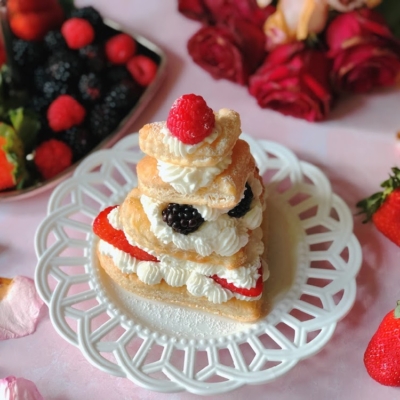 Mixed Berries Mille-Feuille or Napoleon served on a white plate
