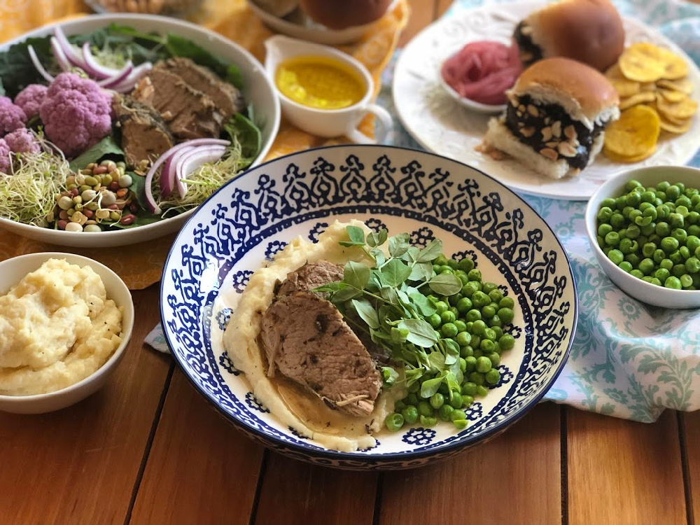 Instant Pot Pork Tenderloin served with mashes potatoes and buttery peas