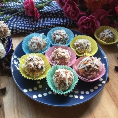 These are the Mexican Chocolate Peanut Truffles with Coconut have condensed milk, oats, chocolate powder, peanuts, coconut flakes, peanut butter, and chocolate morsels.