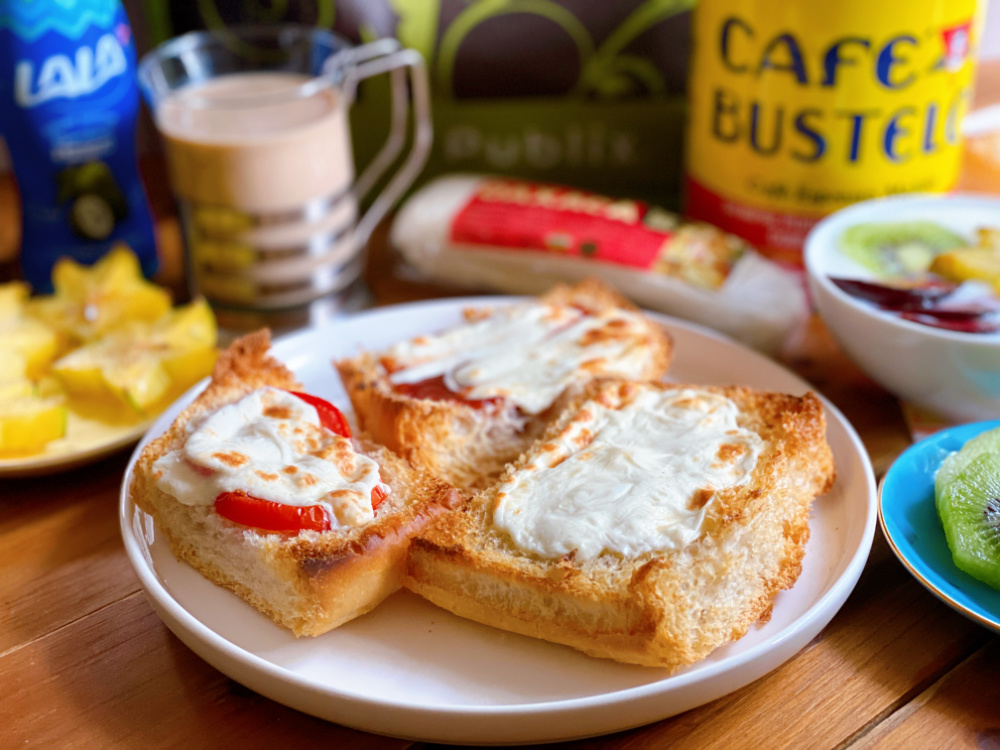 a plate with cheesy toast