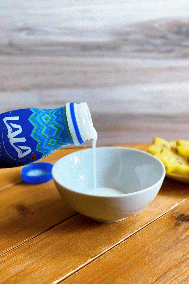 Making an easy smoothie bowl with LALA smoothie yogurt.