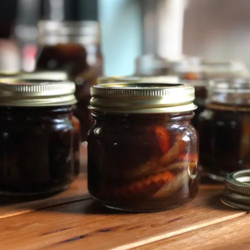 Small mason jars with Sweet Chipotle Peppers from Puebla