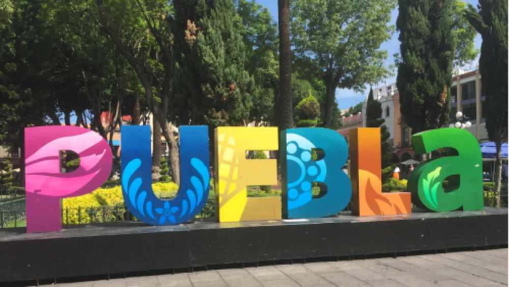 the sign with the letters spelling puebla