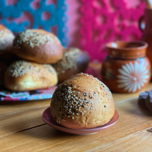 a bread bun with sesame seeds