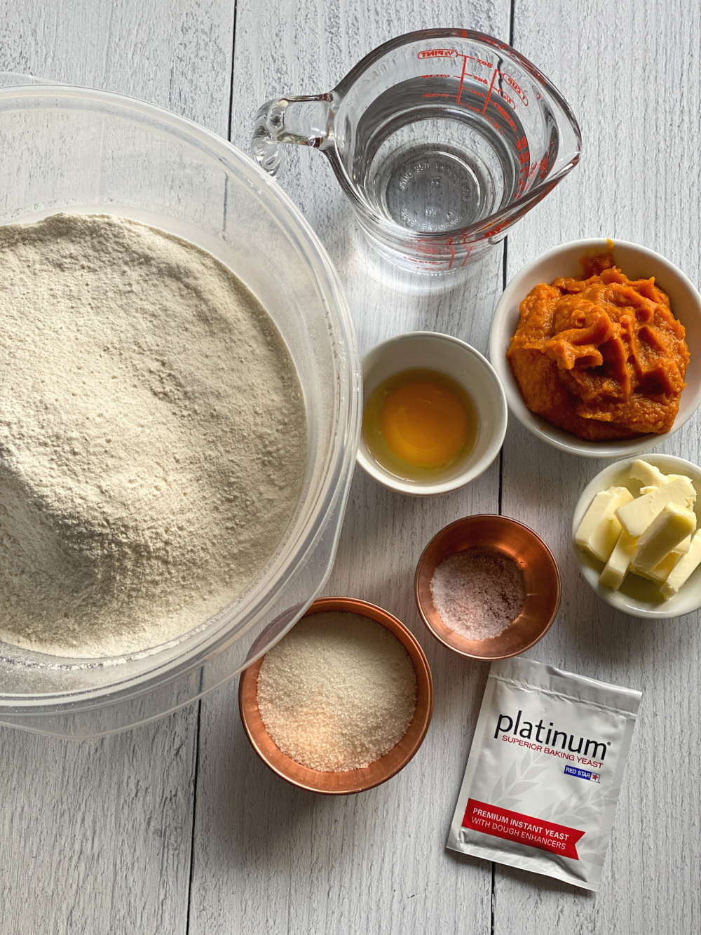 a top shot showing the ingredients for the pumpkin dinner rolls