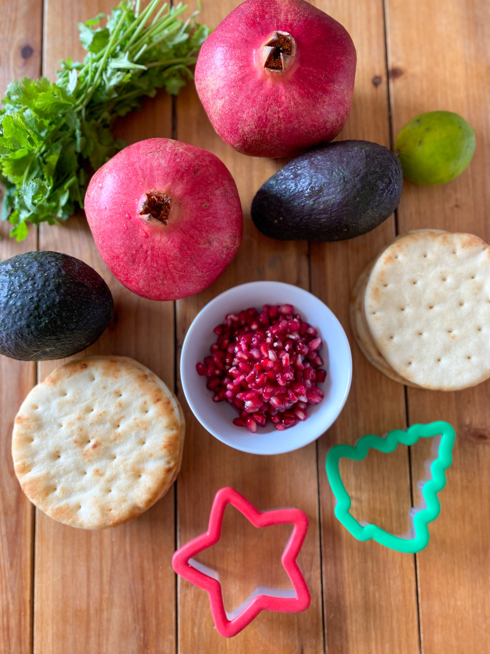 pomegranates, avocados, lime, flatbreads, cookie cutters