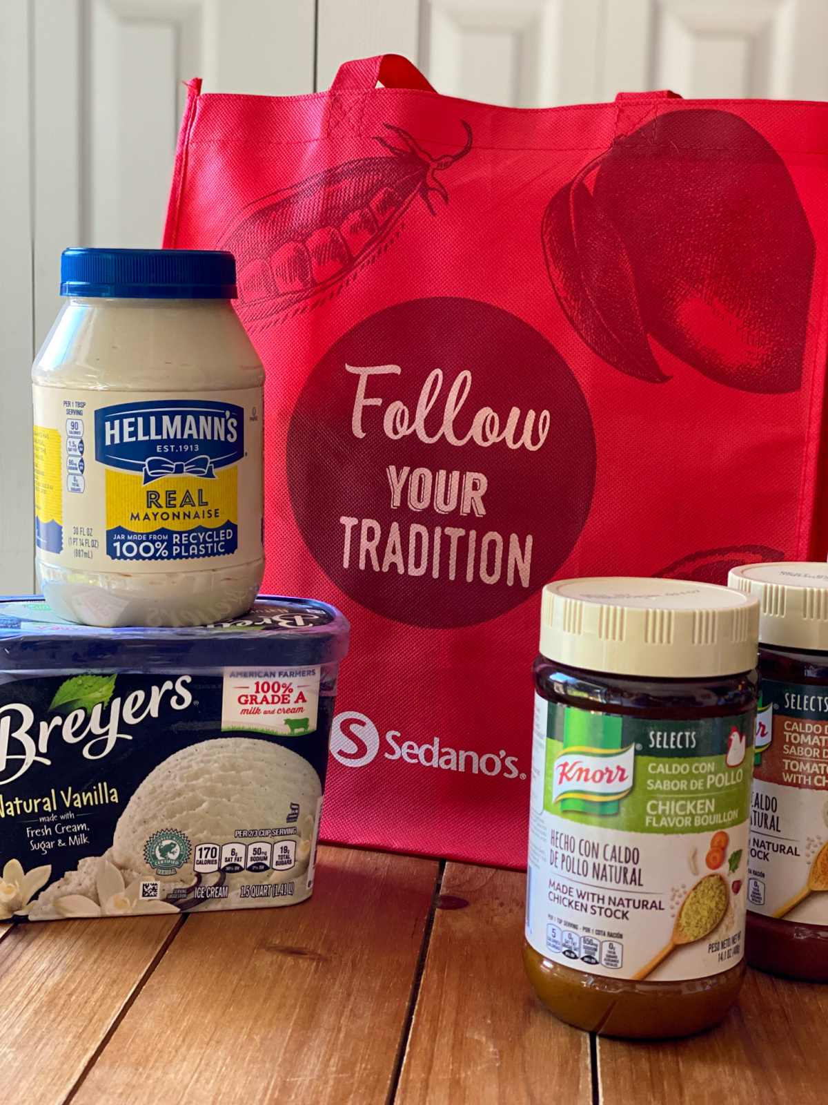 a red bag, mayo, bouillon, and an ice cream tub