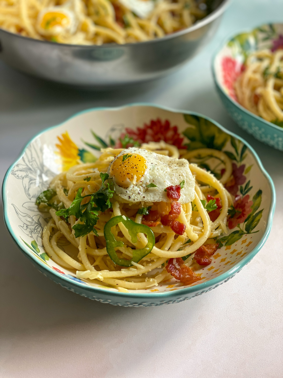 Thick spaghetti pasta dish with bacon