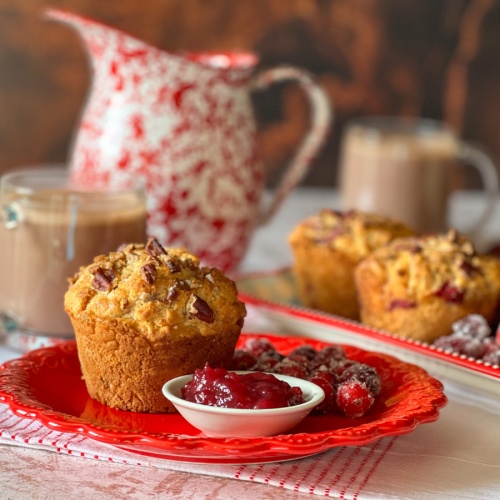 A biscuit formed like muffin served with cranberry jam